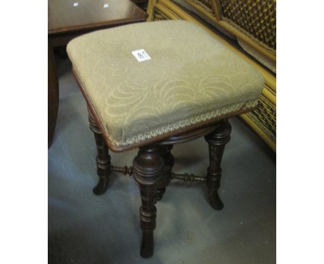 Late Victorian mahogany swivel piano stool on ring turned legs and splay legs. (B.P. 24% incl. VAT)