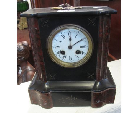 Late Victorian black slate and marble two-train mantle clock with French brass drum movement and enamel Roman face.(B.P. 24% 