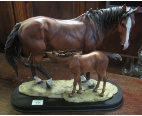 Ceramic mare and foal group on platform base. Modern.(B.P. 24% incl. VAT)
