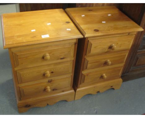 Pair of modern pine narrow chests of three drawers on bracket feet. (2)(B.P. 24% incl. VAT)