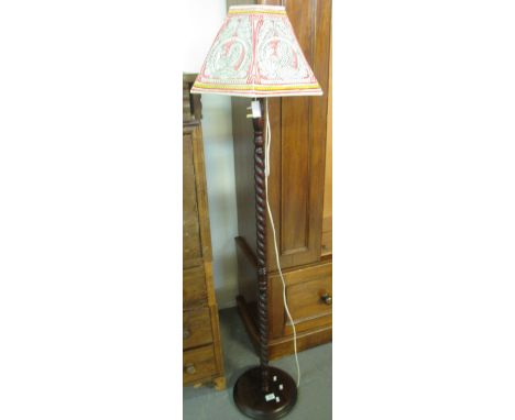 modern mahogany finish barley twist standard lamp with shade.(B.P. 24% incl. VAT)