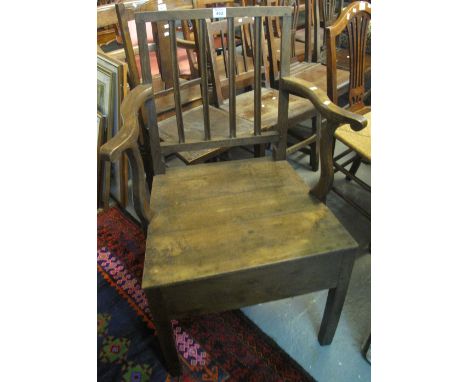 19th century oak stick back open armchair.(B.P. 24% incl. VAT)