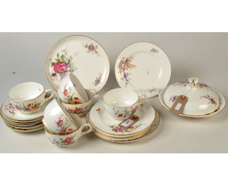 A set of six Worcester floral cups and six saucers, together with seven matching plates and a matching muffin dish and cover 
