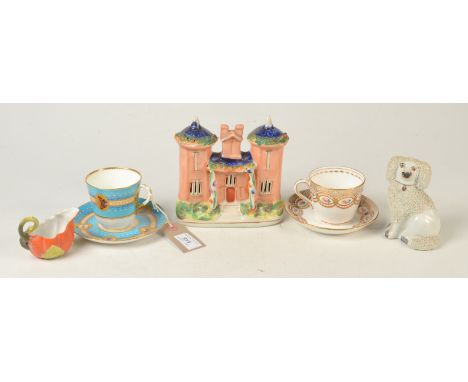 A Worcester cup and saucer painted with gilt ground butterfly panels pattern 8362, together with one Victorian cup and saucer