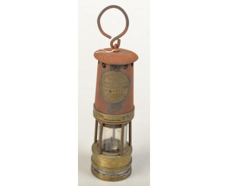 A Hailwood & Ackroyd type 01B steel and brass miners lamp, height excluding suspension ring 26cm. 
