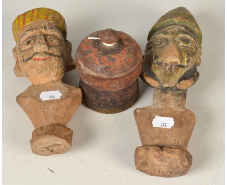 Two Kazakhstan puppet heads and an Indian ointment pot.