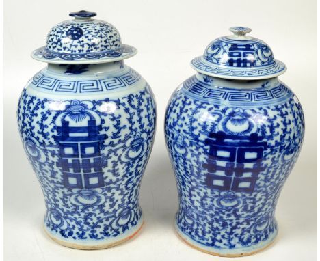 Two Chinese 19th century blue and white baluster jars and covers decorated with the entwined Xi characters that read as Shuan