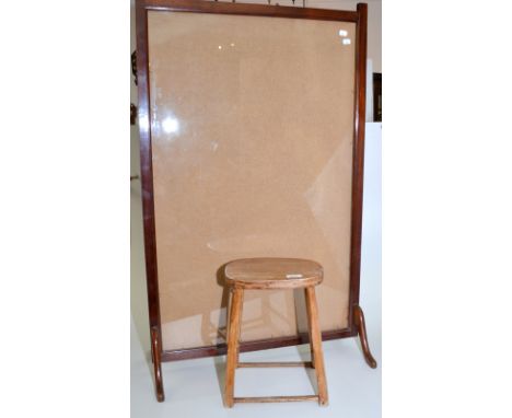 A country made stool and an Edwardian mahogany glazed fire screen.