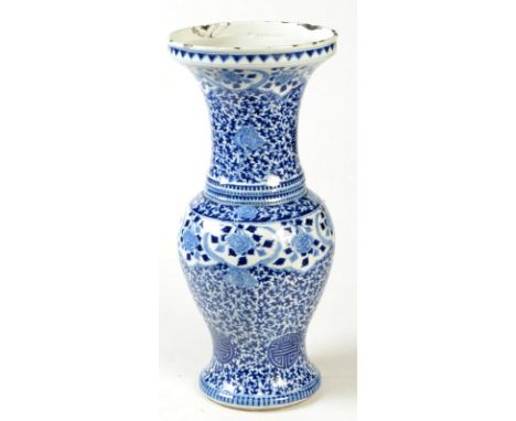 A Chinese blue and white yen yen beaker vase, decorated all over the neck and lower body with Shou characters for longevity o