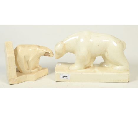 A Geo Conde ceramic sculpture of a polar bear, impressed marks, length 29cm, together with a second polar bear model.