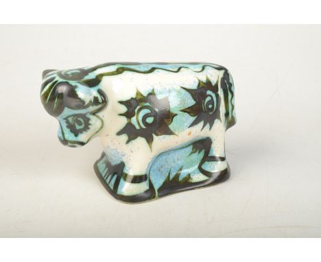 A  Celtic Pottery blue "Medallion" pattern bull, height 14cm.