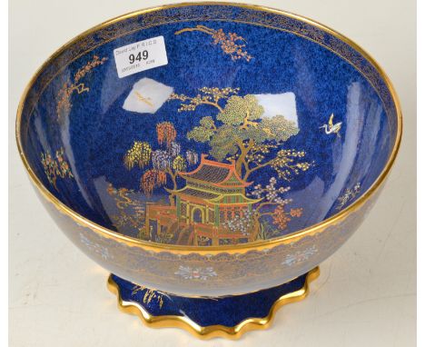 A Carlton Ware powder blue ground bowl with chinoiserie gilt and enamel decoration, diameter 23.3cm.