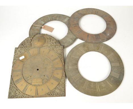 Three longcase clock chapter rings and a longcase clock arched brass dial.   Outside diameter sizes of the chapter rings: 1 x