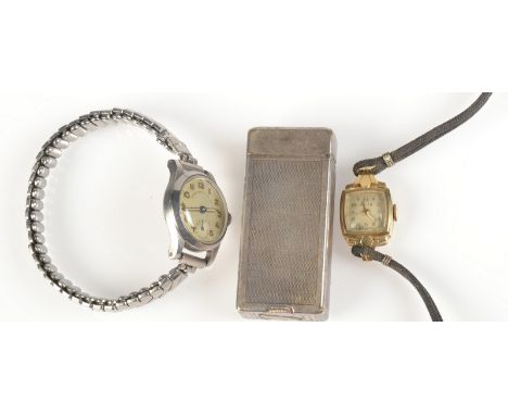 A Dunhill engine turned, Swiss made silver plated cigarette lighter, patent no. 2102108, height 5cm, together with a ladies 1