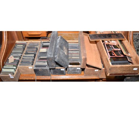 A large collection of magic lantern slides in nine boxes. 