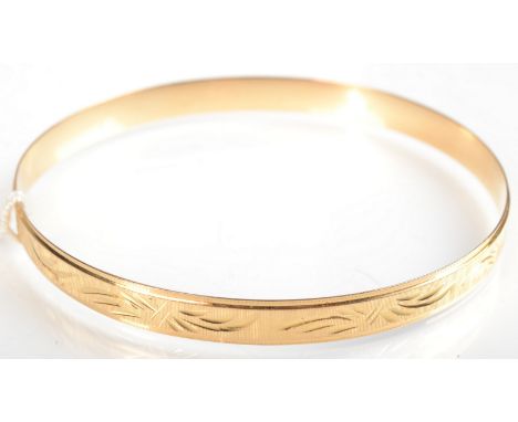 A single 18ct. gold bangle 11.9g.  Condition report: Very minor misshaping. 
