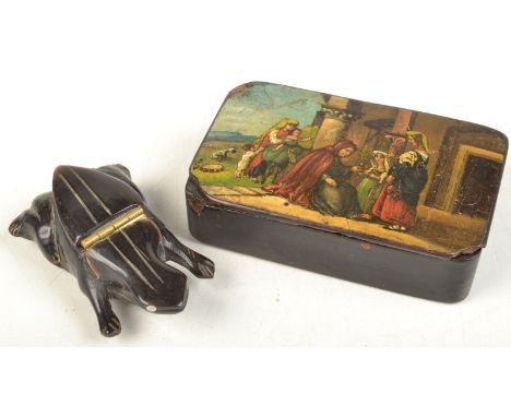 A Victorian papier mache snuff box with painted lid, together with a horn snuff box in the form of a frog.