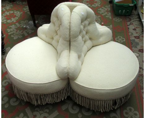 A buttoned Victorian triple centre seat.