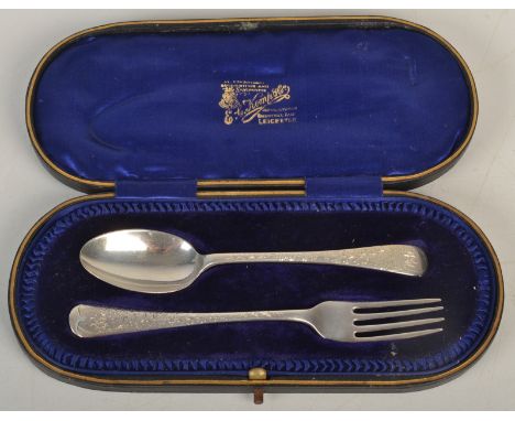 A christening spoon and fork with fern engraved decoration, Sheffield 1914, cased.