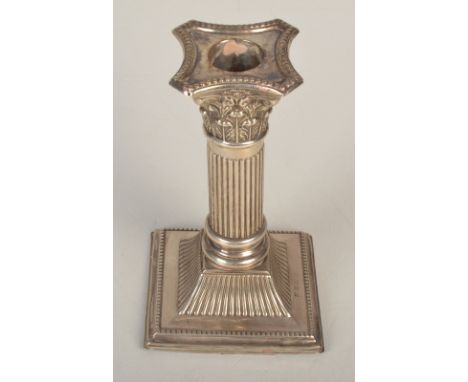 An Edwardian filled silver classical low candlestick.