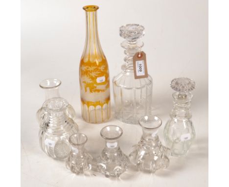 An early 19th century cut glass 'Shrub' decanter and stopper with triple ring neck, together with a bohemian yellow flash eng