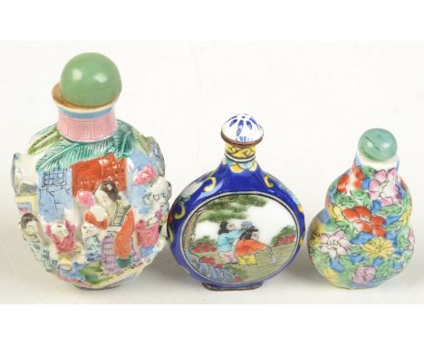 Three Chinese snuff bottles.  Condition report: Large snuff bottle cork split, good condition gilding on rim rubbed (ceramic)