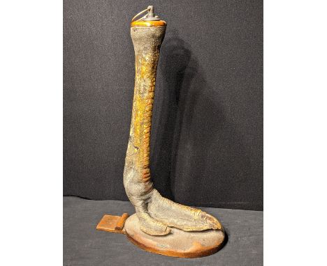Rowland Ward of Piccadilly (1848-1912), a large taxidermy ostrich leg door stop, makers plaque to base, overall item dimensio