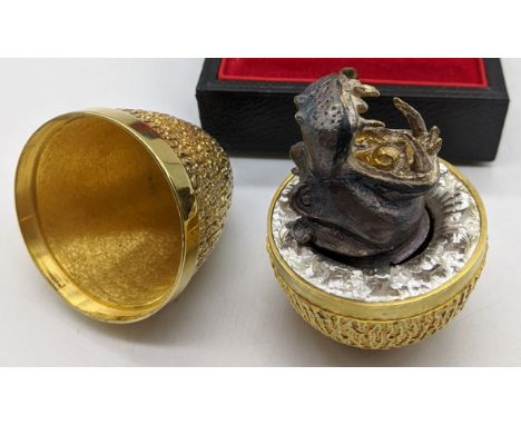 A Stuart Devlin Hippo Surprise silver gilt egg, textured design, numbered 21/300, hallmarked London, 1973, with case
