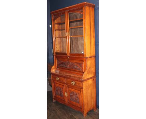 VICTORIAN WALNUT CABINET BUREAU BOOKCASE the cornice with adjustable shelving below two glazed doors, fall front writing surf