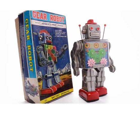 JAPANESE SH HORIKAWA BATTERY OPERATED GEAR ROBOTthe silver tinplate body with red and white dial to head, red feet, the glaze