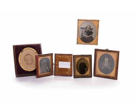 COLLECTION OF FOUR VICTORIAN AMBROTYPESto include portraits of a young gentleman, a young boy, a young girl sitting on a chai