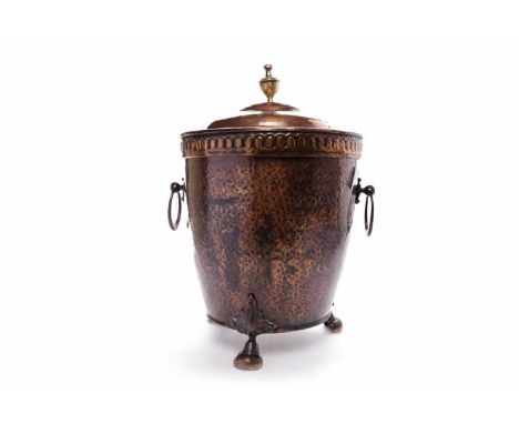 VICTORIAN COPPER PLATED COAL SCUTTLEof tapering oval form, the lid with turned finial and the hammered body with two ring han