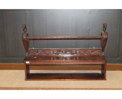 ATTRACTIVE VICTORIAN WALNUT HANGING WALL BRACKETwith outset carved griffin supports with open shelf beneath, 97cm long, 67cm 