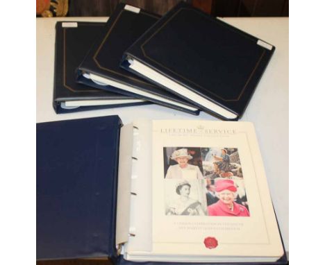 FOUR COLLECTIONS OF FIRST DAY COVERSeach in a ringbinder including the Coronation Jubilee Mint Stamp Collection