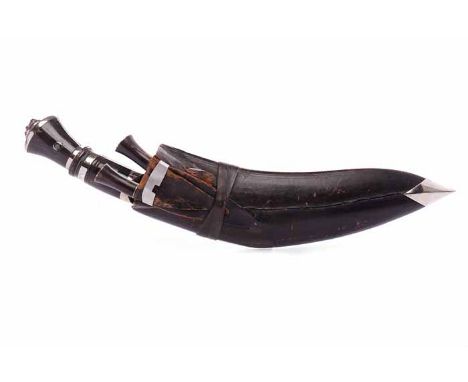 DECORATIVE KUKRI KNIFEwith horn handles, contained in a leather scabbard, 46cm long 