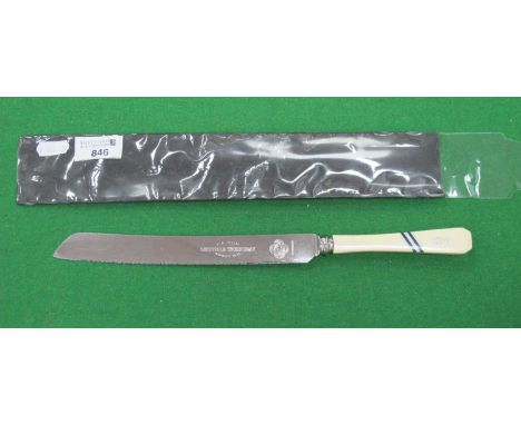 Sheffield Wednesday 1935 Bread Knife with Two Blue Stripes and Trophy to Ivorine Handle, the stainless blade etched with 'She