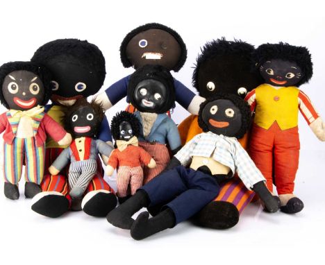 Nine Gollies, including  a large Chad Valley with royal blue jacket and stripped trousers and side seam label --25in. (63.5cm