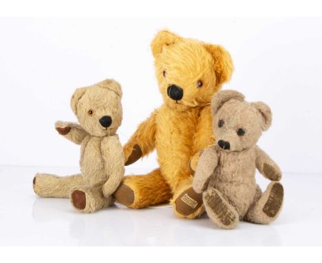 Three Merrythought teddy bears,  a 1930s Bingie baby bear, with wool plush swivel head and button to ear --9 1/2in. (24cm.) h