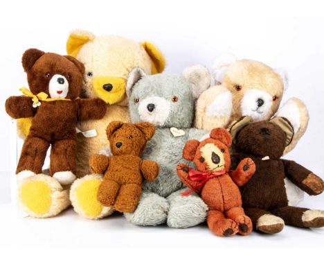 A large quantity of unjointed manufactured teddy bears,  including a large Chad Valley bear, with peach synthetic plush --28i