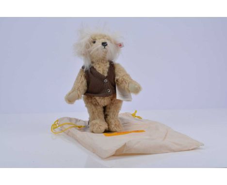 A Steiff limited edition Einstein teddy bear, 141 of 1905, with light beige mohair, E= MC² embroidered to foot pad, in fabric