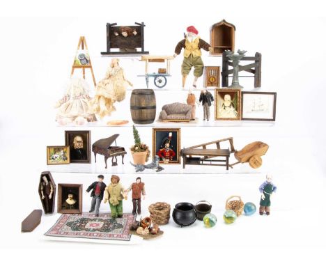 A quantity of modern dolls' house dolls and furniture,  nine dolls of varying sizes, including one in Stocks, a Pirate with p