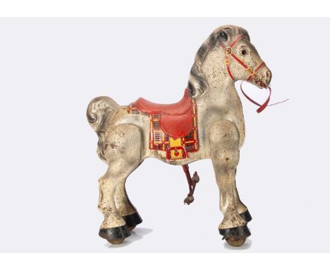 A Mobo 1940 - 50s child's pedal /pull along horse, with remains of original sticker to chest --30 1/2in. (77cm.) high; and a 