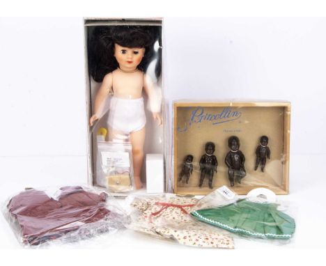 A Petitcollin Marie- Francoise doll,  with vinyl head, brown sleeping eyes, long brown hair, in original box with plastic win