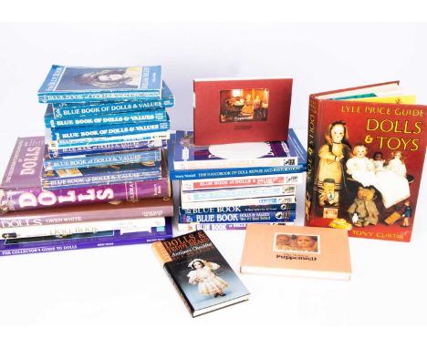 Twenty four doll reference/guide books,  including volumes three to sixteen of the Blue Book of Dolls and Values by Jan Foulk