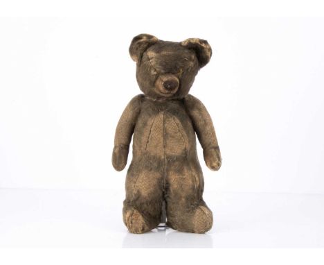 A 1930s Chad Valley clown bear, with blue mohair body, white inner ears, and label to foot pad --12 1/2in. 932cm.) high (miss