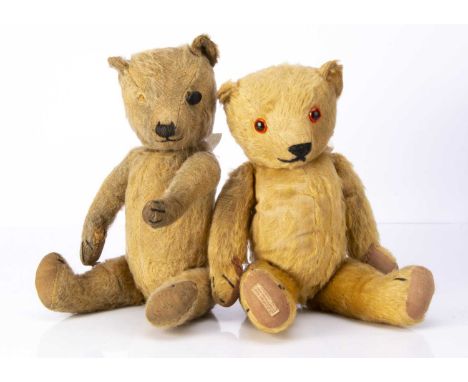 Two British teddy bears,  a blonde mohair, with replacement black shoe button eye (one missing), black stitched nose and mout