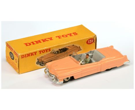 Dinky Toys 131 Cadillac Tourer - Peach Body, grey interior, figure driver, silver trim and light beige rigid hubs - Excellent