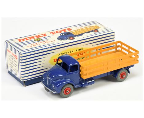 Dinky Toys 931 (531) Leyland Comet Lorry - Blue cab and chassis , deep yellow stake back, red supertoy hubs with grey tyres, 