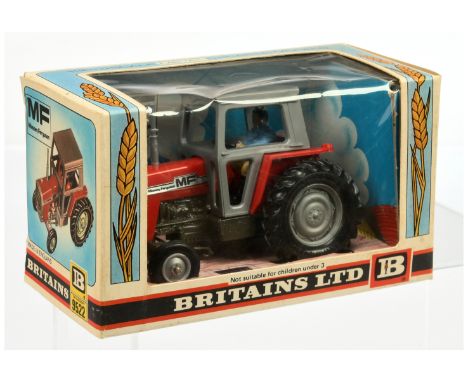 Britains 9522 Massey Ferguson 595 Tractor - Red and grey including hubs and cab with figure driver - Near Mint in a Good Plus