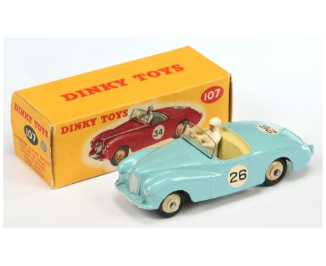 Dinky Toys 107 Sunbeam Alpine Sports Car - Light blue, pale cream interior with figure driver, silver trim, light beige rigid